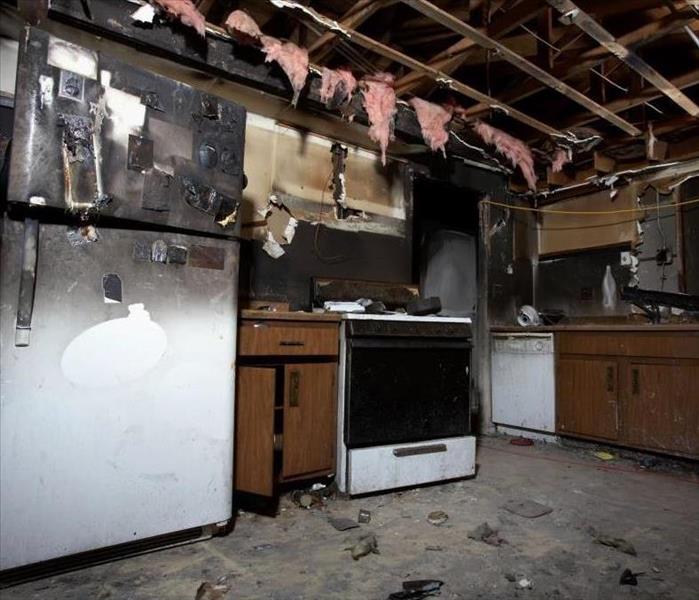 Kitchen that has had a fire